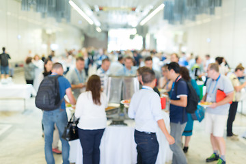 Image showing Abstract blurred people socializing during lunch break at business conference.