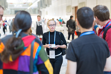 Image showing People interacting during coffee break at medical conference.