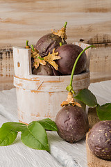 Image showing Passion fruits s on a wooden table