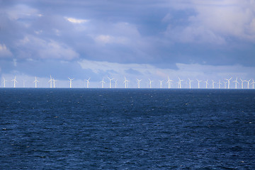 Image showing Windmills in a row in the Baltic sea