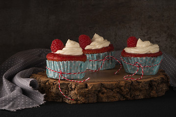 Image showing Red cupcakes with cream cheese frosting