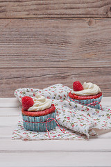 Image showing Red cupcakes with cream cheese frosting