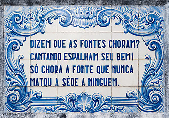 Image showing Panel of traditional Portuguese tiles hand-painted blue and whit