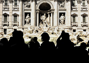 Image showing Trevi fountain and tourists shooting