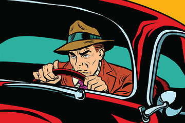 Image showing Serious retro man driving a car