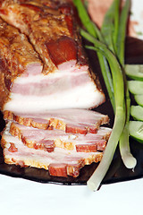 Image showing pieces of fresh cooked meat with spring onions
