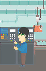 Image showing Engineer standing near control panel.