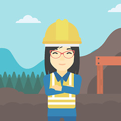 Image showing Miner with mining equipment on background.