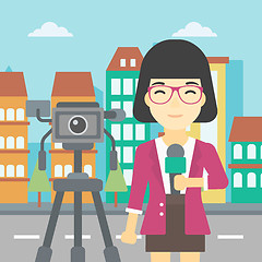 Image showing TV reporter with microphone and camera.