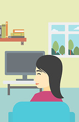 Image showing Woman watching TV.