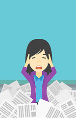 Image showing Stressed business woman having lots of work to do.