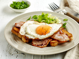 Image showing fried egg, bacon and toasted bread