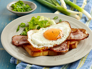 Image showing toasted bread, bacon and fried egg