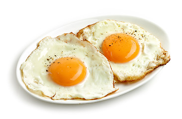 Image showing fried eggs on white background