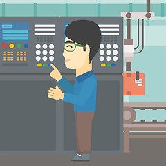 Image showing Engineer standing near control panel.