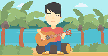 Image showing Musician playing acoustic guitar.