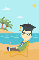 Image showing Graduate lying in chaise lounge with laptop.