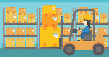 Image showing Warehouse worker moving load by forklift truck.