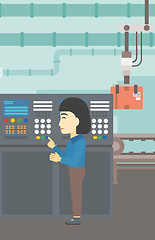 Image showing Engineer standing near control panel.