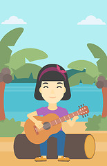 Image showing Musician playing acoustic guitar.