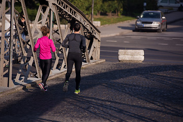 Image showing young  couple jogging