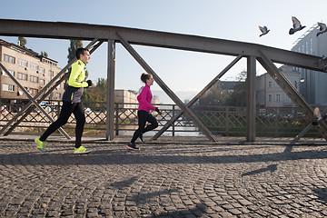 Image showing young  couple jogging