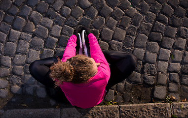 Image showing woman  stretching before morning jogging