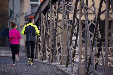 Image showing young  couple jogging