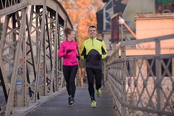 Image showing young  couple jogging