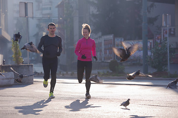 Image showing young  couple jogging