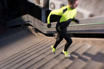 Image showing man jogging on steps