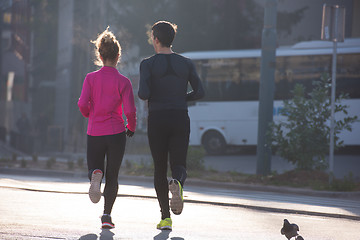 Image showing young  couple jogging