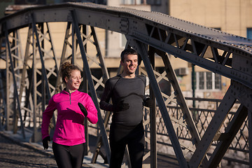 Image showing young  couple jogging