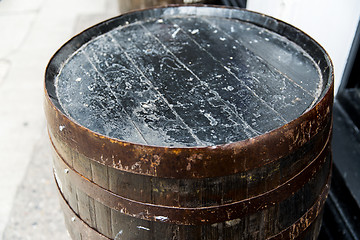 Image showing close up of old wooden barrel outdoors