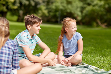 Image showing group of happy kids or friends outdoors