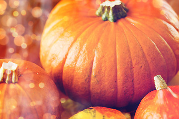 Image showing close up of pumpkins on wooden table at home