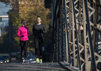 Image showing young  couple jogging