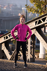 Image showing woman  stretching before morning jogging