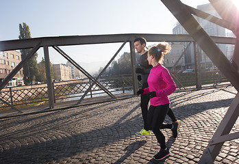 Image showing young  couple jogging