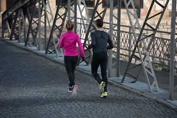 Image showing young  couple jogging