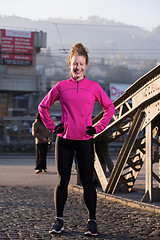 Image showing woman  stretching before morning jogging