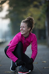 Image showing woman  stretching before morning jogging