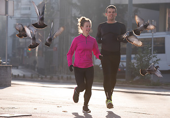 Image showing young  couple jogging