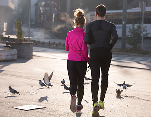 Image showing young  couple jogging