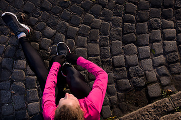 Image showing woman  stretching before morning jogging