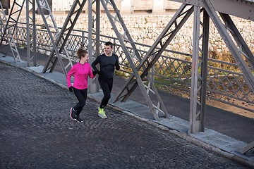 Image showing young  couple jogging