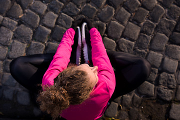 Image showing woman  stretching before morning jogging