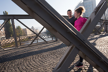 Image showing young  couple jogging