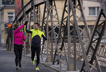 Image showing young  couple jogging