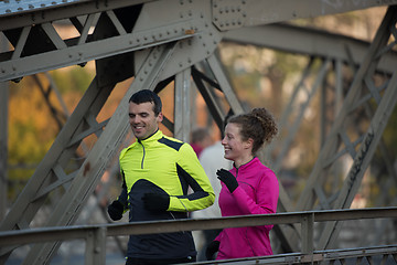 Image showing young  couple jogging